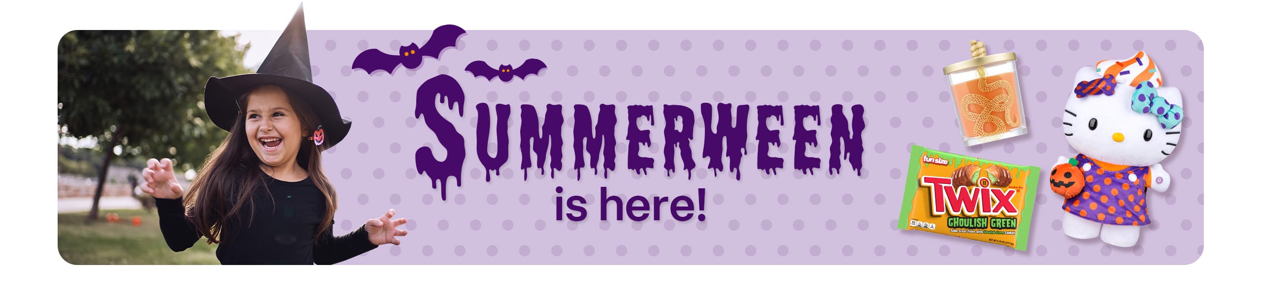 Summerween is here! A little girl dressed in a black witch hat and costume, a Twix candy bar, an orange candle with a snake on it and a Halloween-themed Hello Kitty plush doll against a purple polka dot background with purple bats and a grassy area