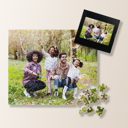 Personalized photo of a family outside on a puzzle, with some of the puzzle pieces broken up.