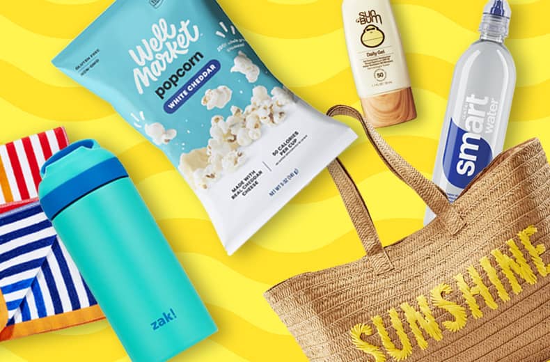Summer essentials including beach towel, Zaki insulated water bottle, Well Market popcorn, Sun Bum sunscreen and smartwater bottle