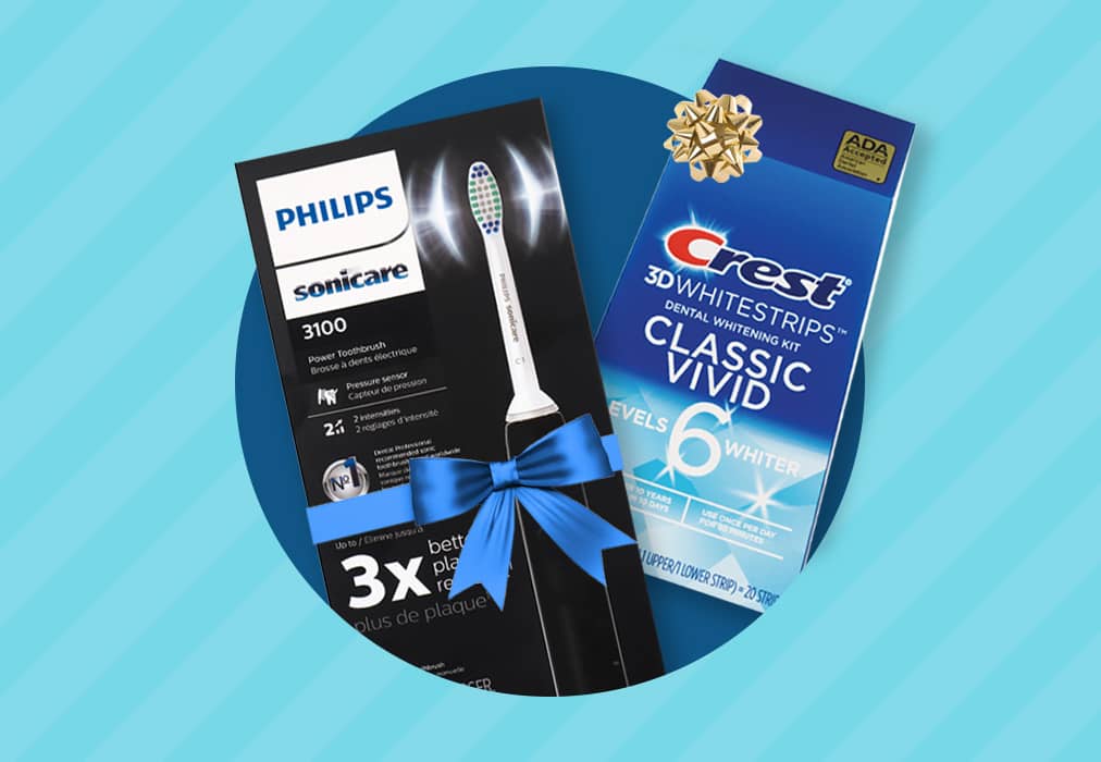 Philips Sonicare power toothbrush and Crest 3D Whitestrips dental whitening kit.