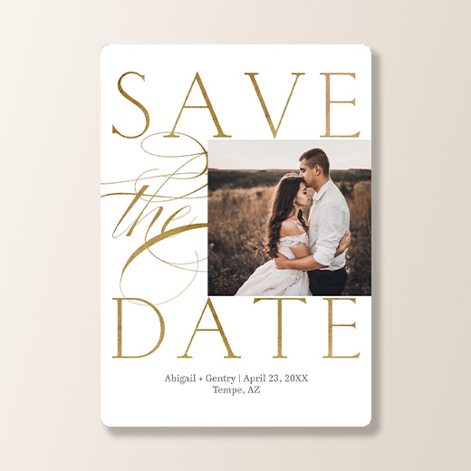 Save-the-date wedding card with a couple embracing.