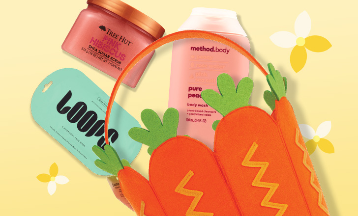 Carrot felt Easter basket, Method Body wash, Tree Hut Pink Hibiscus scrub and Loops face mask against a yellow background with white and yellow flowers