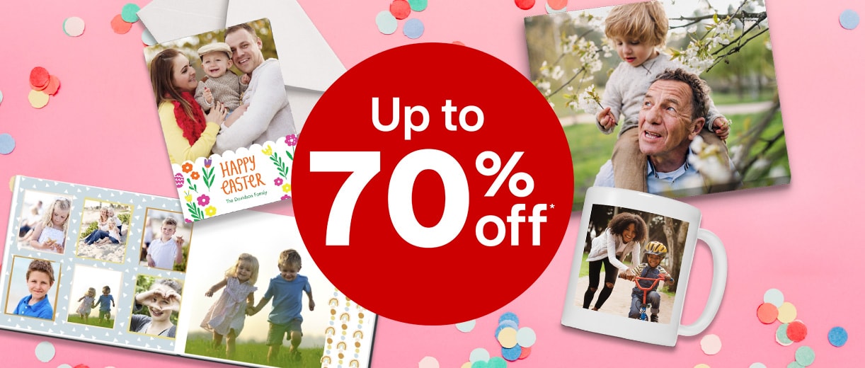 Up to 70% off. Personalized mug, photo book, card and envelope and print with photos of families and children smiling to camera against a pink background and colorful confetti