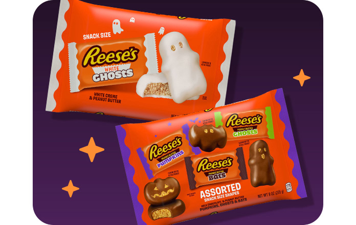 Reese’s bags of ghosts candy and assorted snack size shapes of pumpkins, ghosts and bats.
