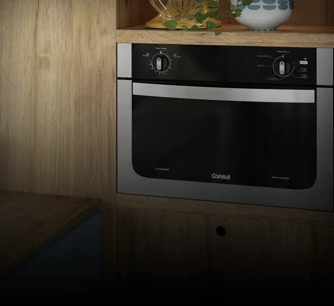 Cozinha com forno de embutir instalado.