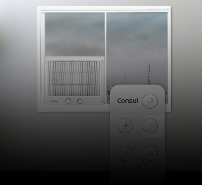 Ar-condicionado instalado na janela com controle remoto no primeiro plano