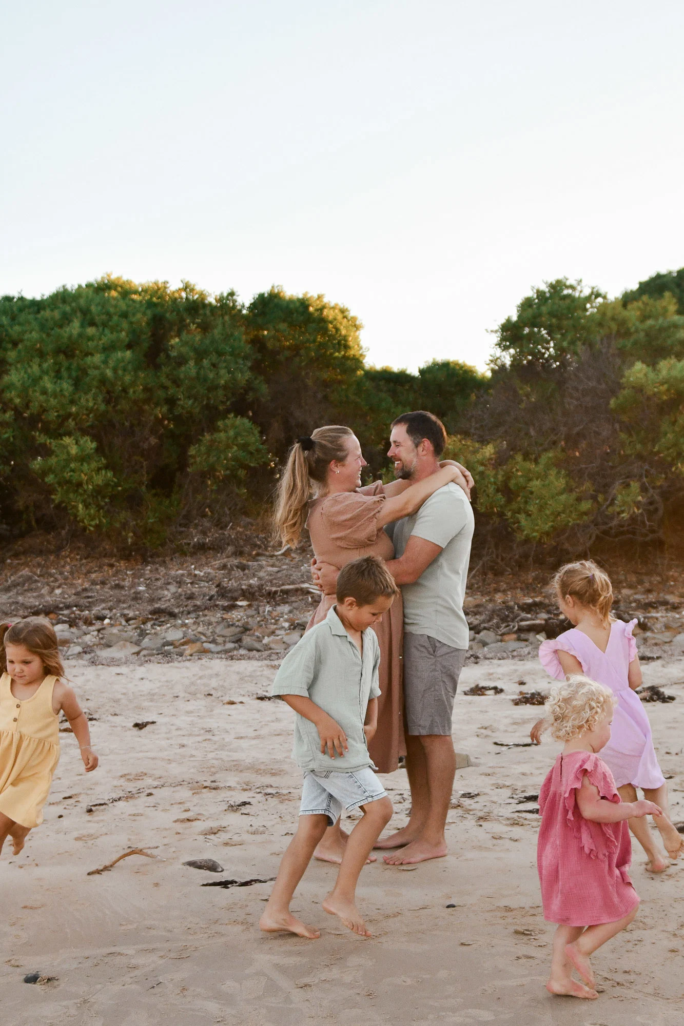 A family in soft neutral tones during a Launceston photo session