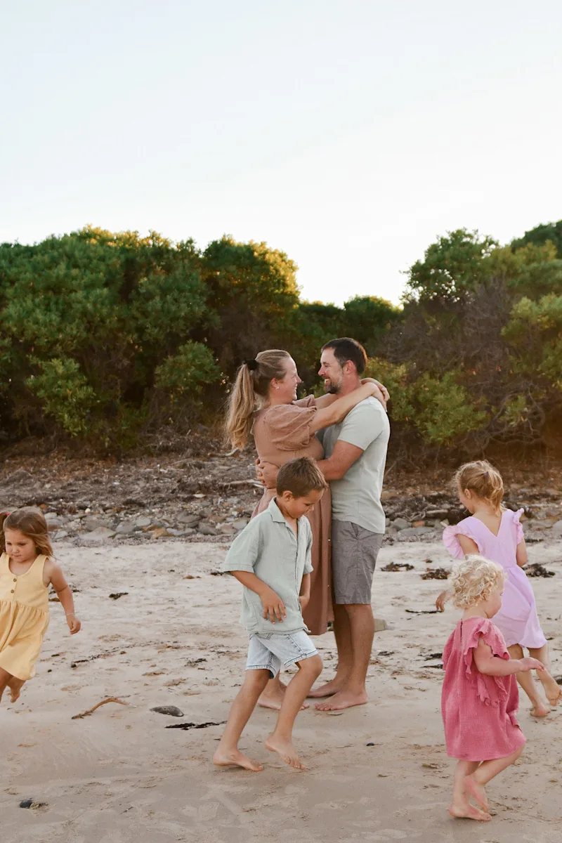 A family in soft neutral tones during a Launceston photo session