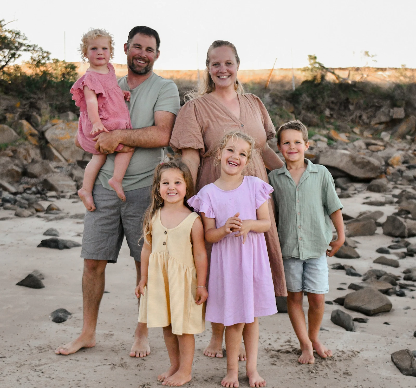 A family together at a Launceston location during golden hour