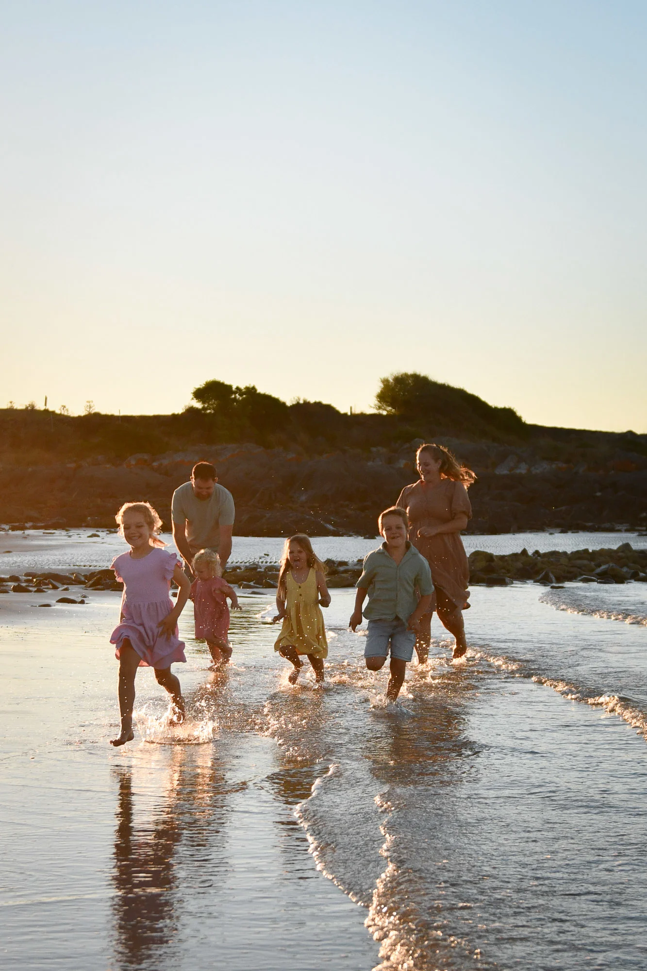 Warm golden-hour light during a Launceston family session