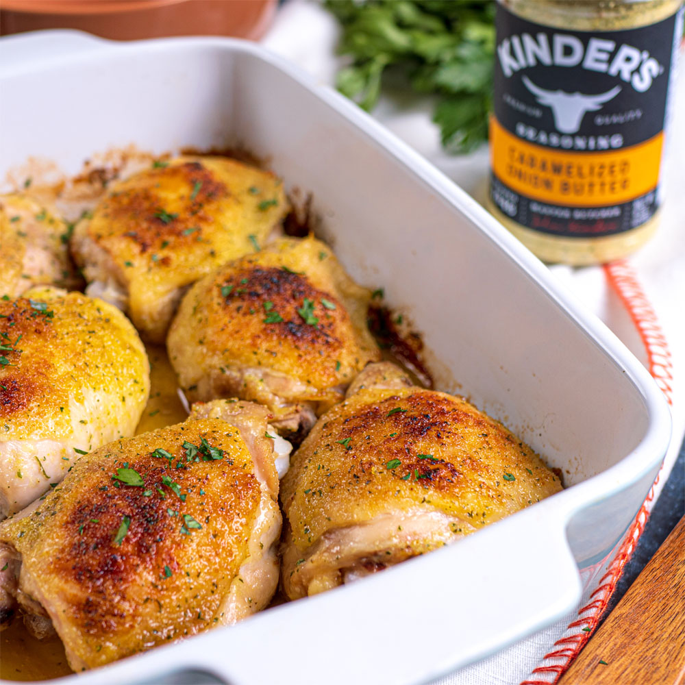 Casserole dish with roasted chicken thighs