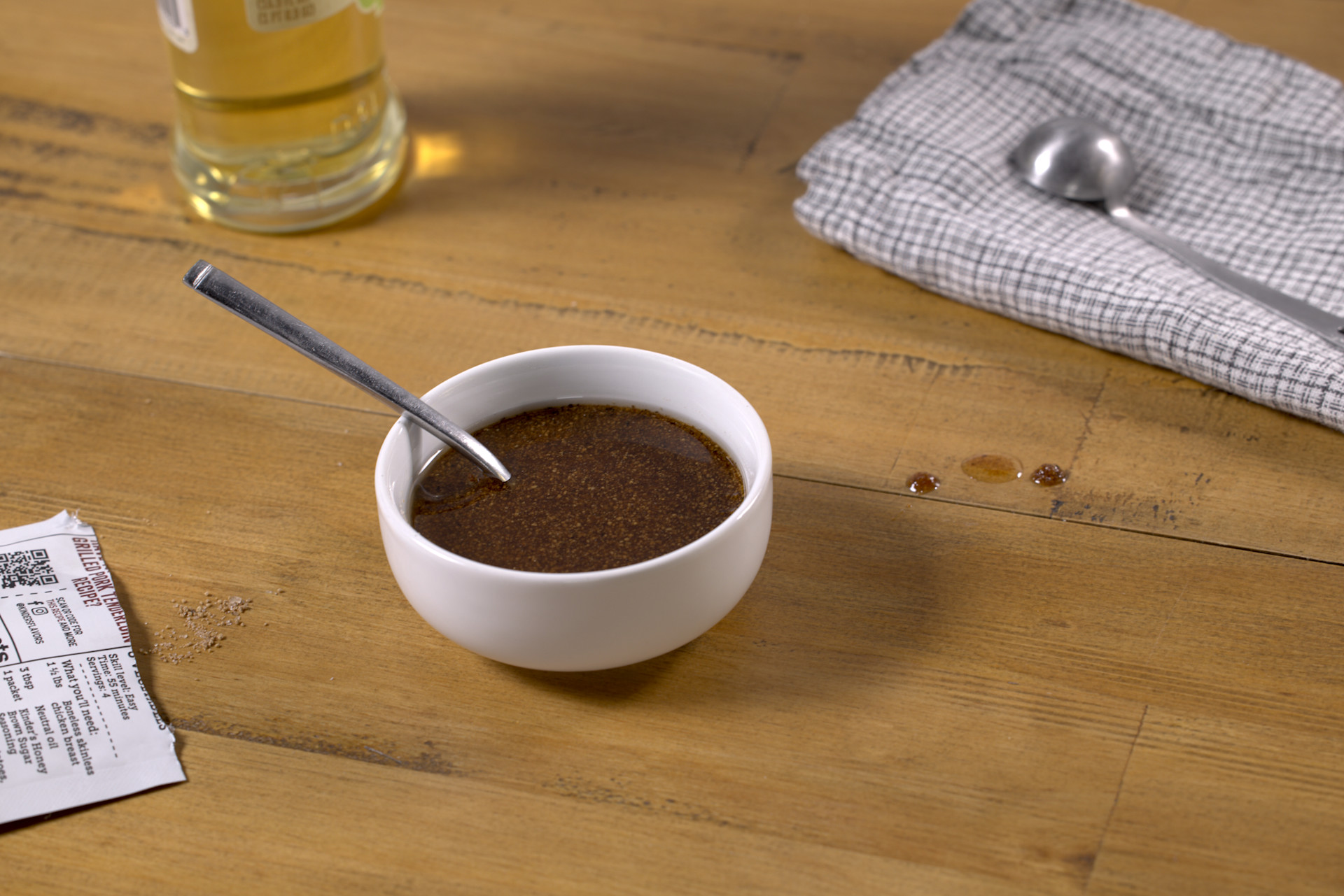 Honey Brown Sugar Marinade in a white bowl with a spoon