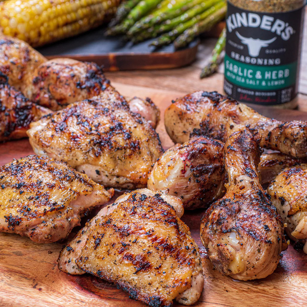 Grilled seasoned chicken thighs and drums