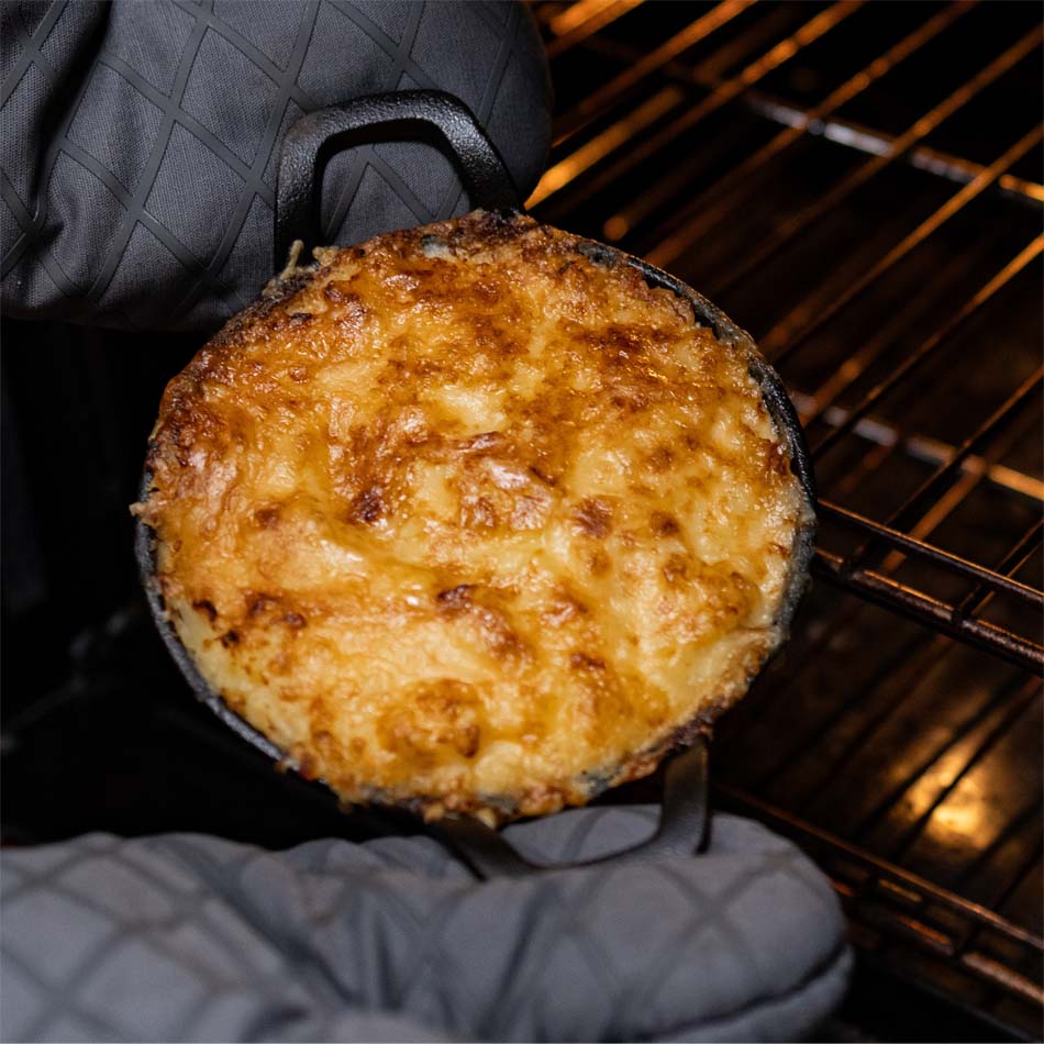 cheesy au gratin potatoes in cast iron