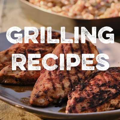 Grilled chicken on a plate with text "Grilling Recipes: Your Guide for everything from weeknight dinners to backyard parties."