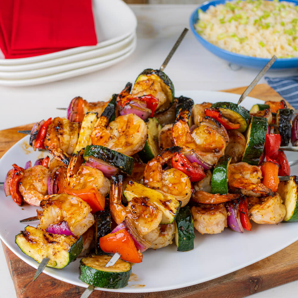 Shrimp and vegetables cooked on skewers