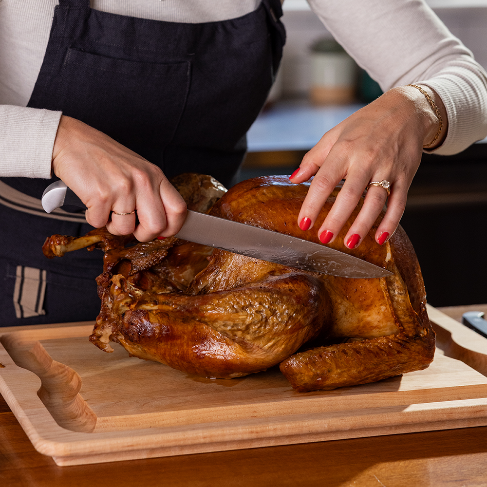 Roasted turkey being carved