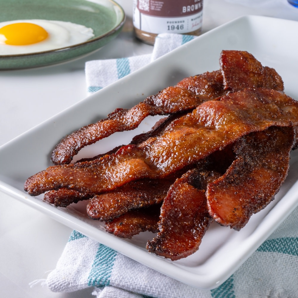 Candied bacon a white platter