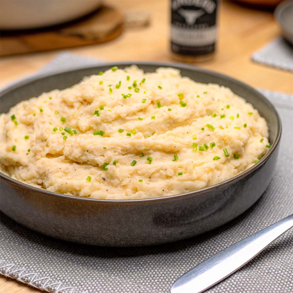 Bowl of mashed potatoes with chives