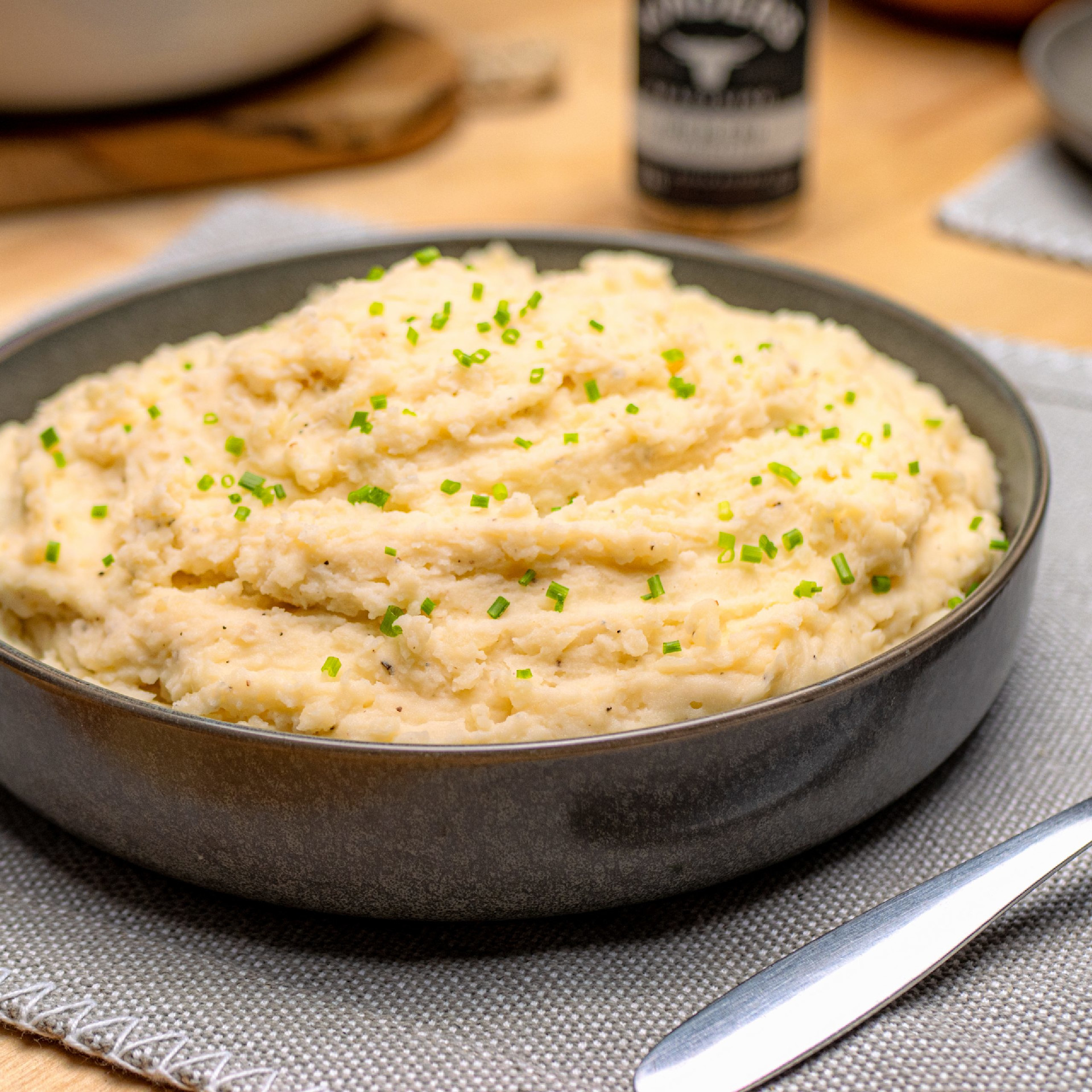 Bowl of mashed potatoes with chives