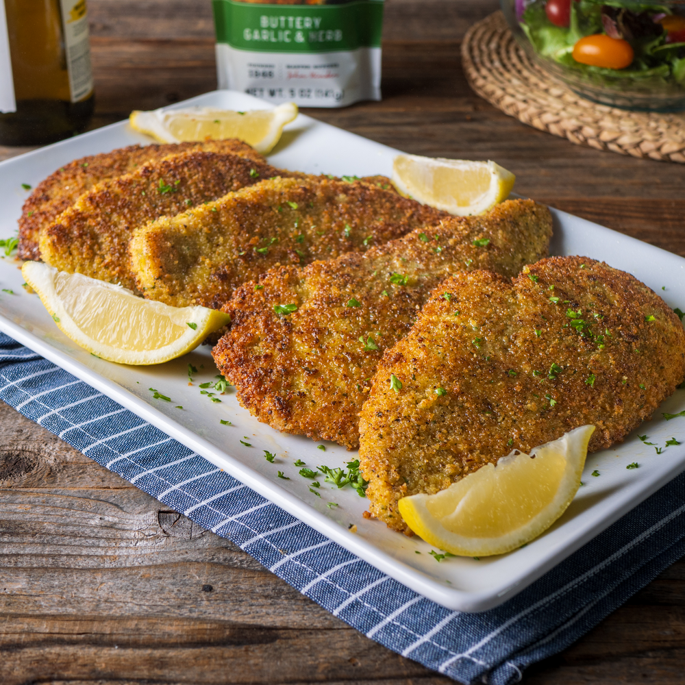 Chicken cutlets on white tray