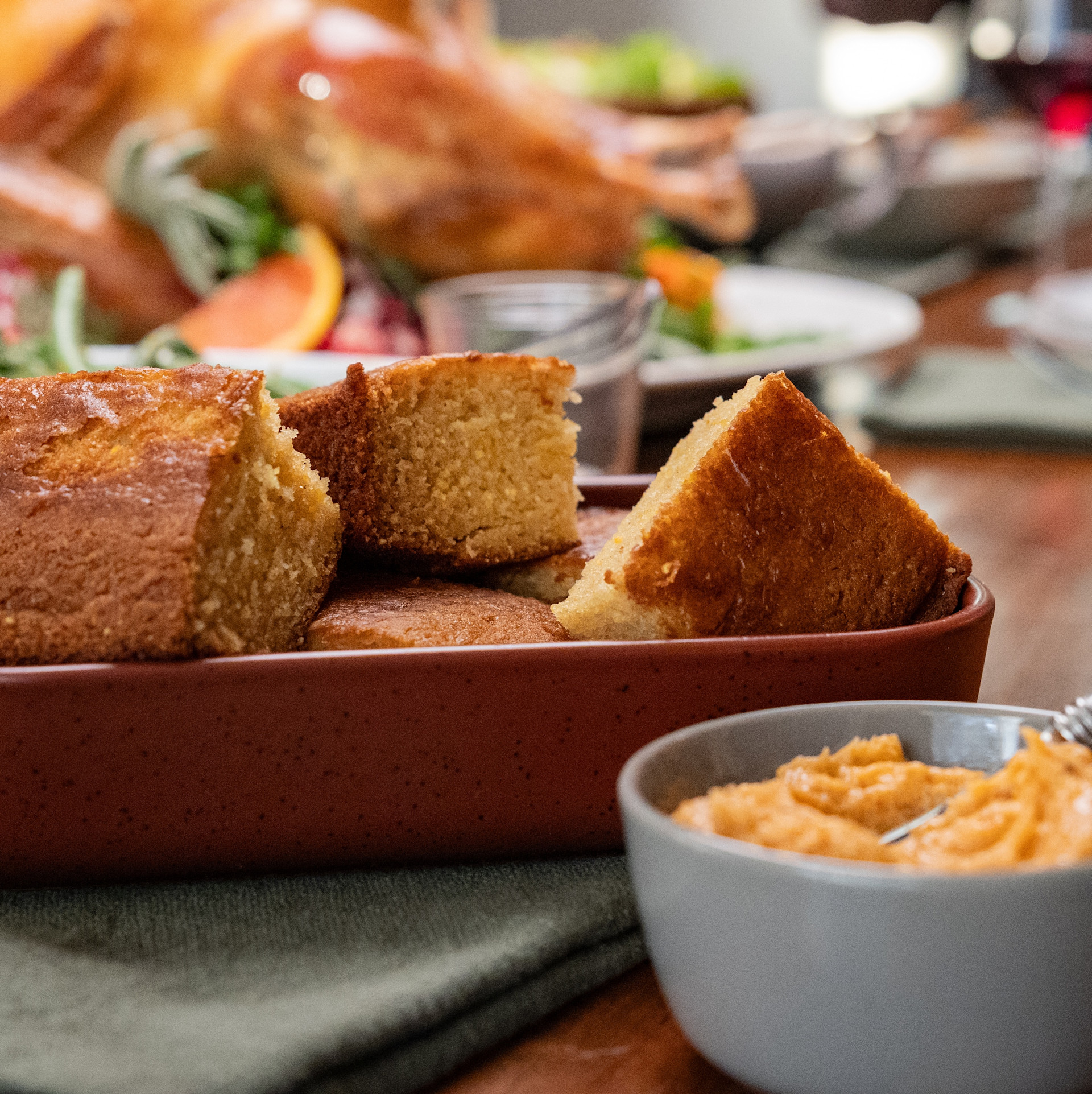 sliced cornbread with bbq honey butter