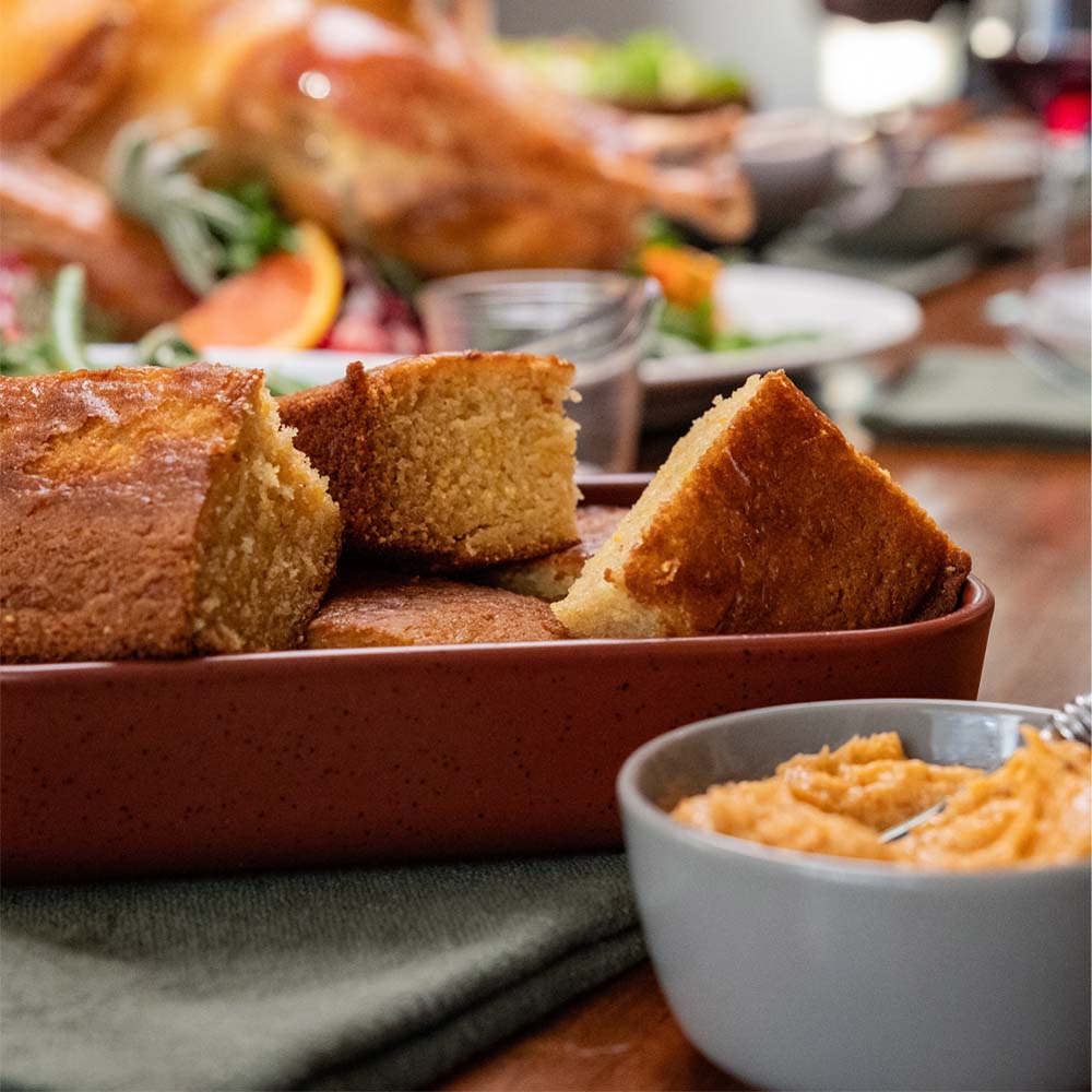 sliced cornbread with bbq honey butter