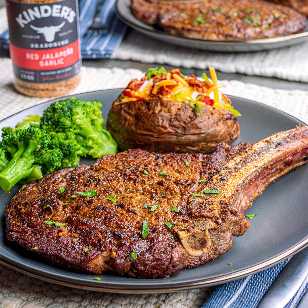 Grilled ribeye with loaded baked potato and broccoli