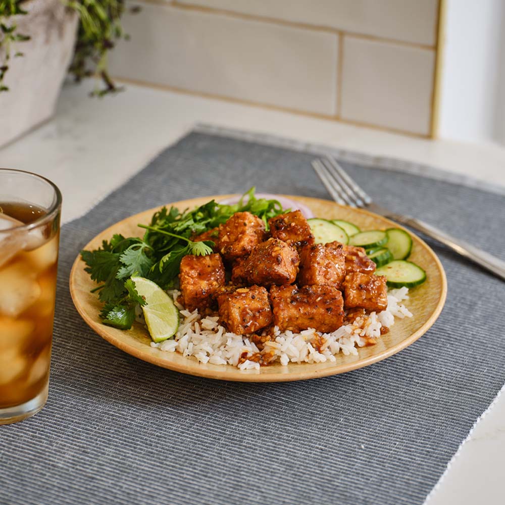 Chili Garlic Tofu on a plate with rice
