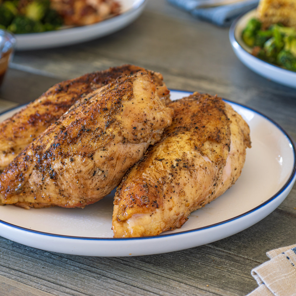Grilled chicken breast on plate