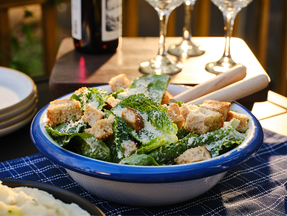 Caesar salad on a picnic table