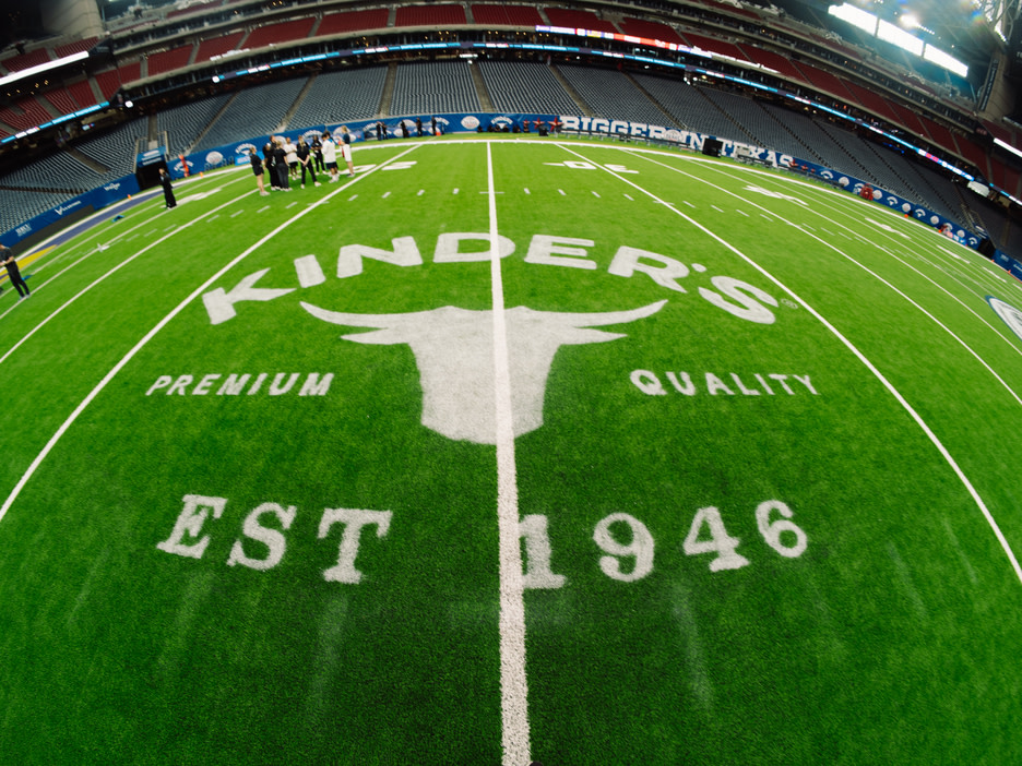 Kinder's logo on a football field