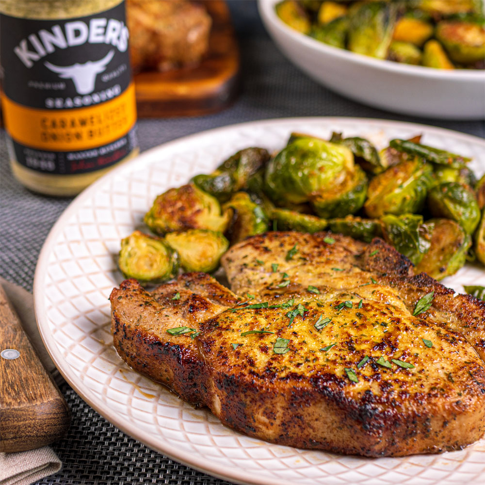 Pork chop with brussels sprouts on plate