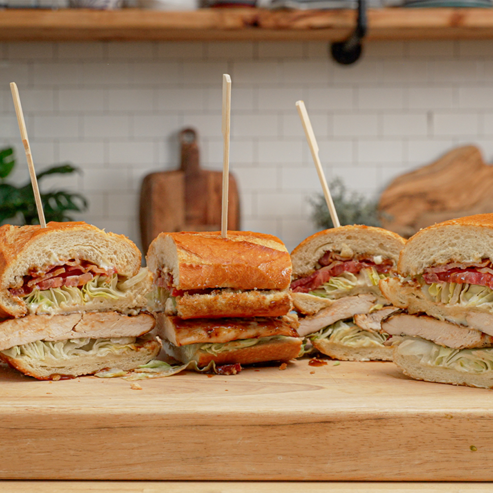 Sliced grilled chicken club sandwich