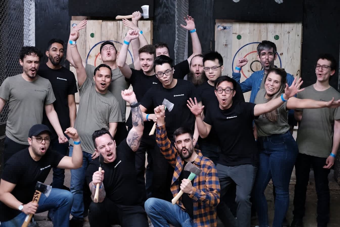 Quantum mob celebrating at axe throwing event