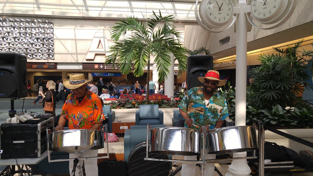 Pop N Steel Jan 2017 playing steels drums in a terminal at MCO.