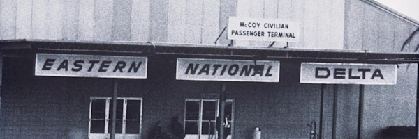Old black and white outside photo of McCoy Civilian passenger terminal.