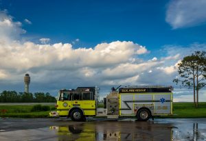 ARFF fire vehicle with GOAA tower in the background.