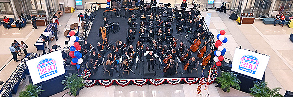Orchestra playing music in Terminal C celebrating 4th of July.