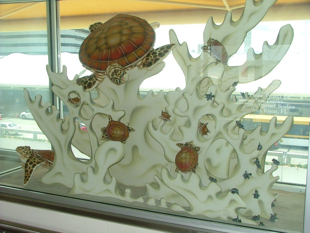 Artist: Todd Warner
Details: 1992, Mixed media sculptural installation
Collection: GOAA Art Collection
Location: Level 4, East & West