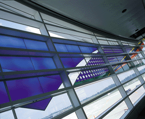 Artist: Guy Kemper
Details: 2002, 14 by 100 feet, Stained glass
Collection: GOAA Art Collection
Location: Bridge to Ground Transportation Facility