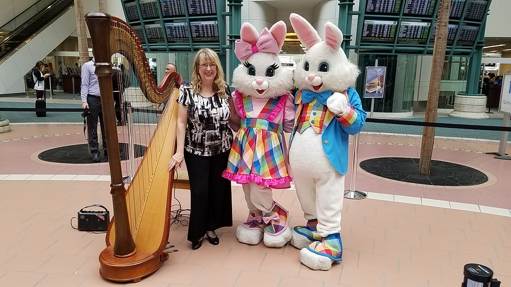 Spring Bunnies and Victoria Schultz 2017 standing in Grand Atrium area.