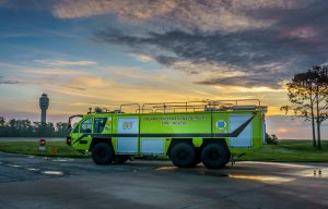 ARFF fire vehicle with GOAA tower in the background.