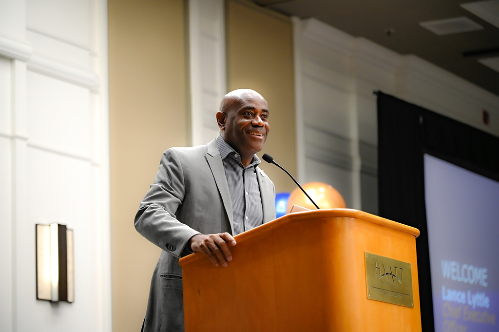 2025 Employee Recognition Brunch photo of Lance Lyttle at a podium giving a speech. 