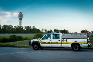 ARFF fire vehicle with GOAA tower in the background.