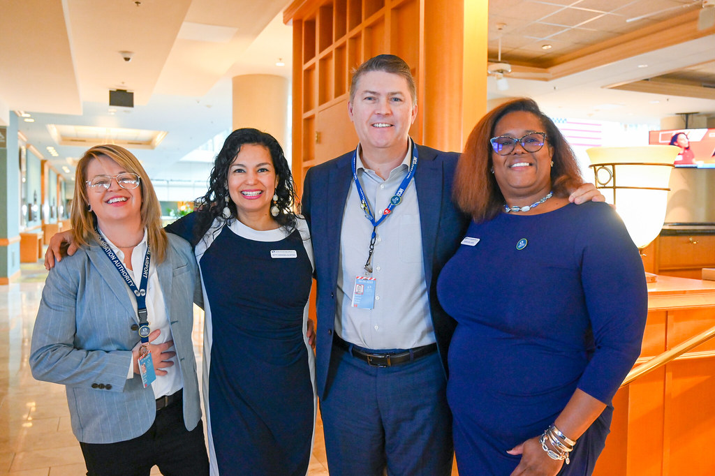 January 2024 Employee Recognition Brunch group photo of four GOAA employees standing next to each other.