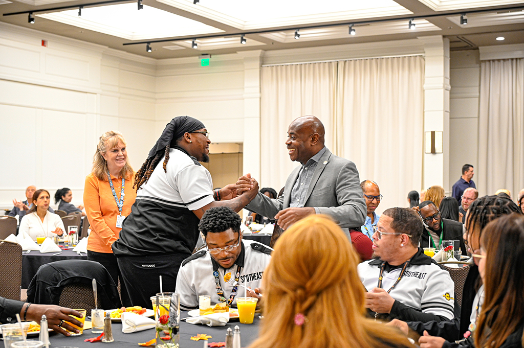 2025 Employee Recognition Brunch group photo with Lance Lyttle giving a handshake to an employee.