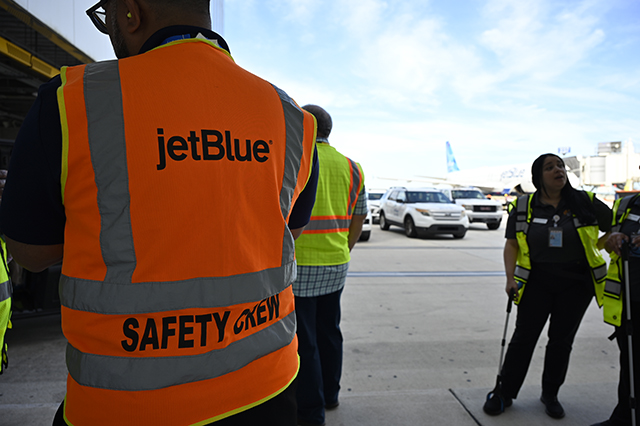 JetBlue FOD Walk outside photo of JetBlue employees.