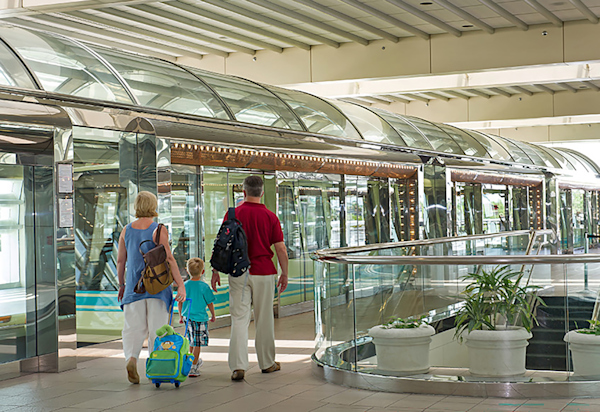 Photo of a family boarding a Gate Link.