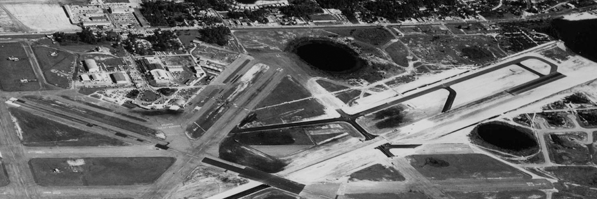 An old 1968 black and white aerial photo of McCoy Air Force Base. Airlines complete relocation to McCoy AFB, making ORL primarily a general and corporate aviation airport.